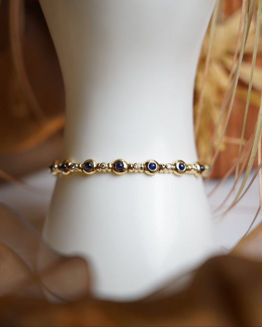 „Celestial Harmony“ – Armband aus 585/- Gelbgold mit Brillant- & Saphirbesatz