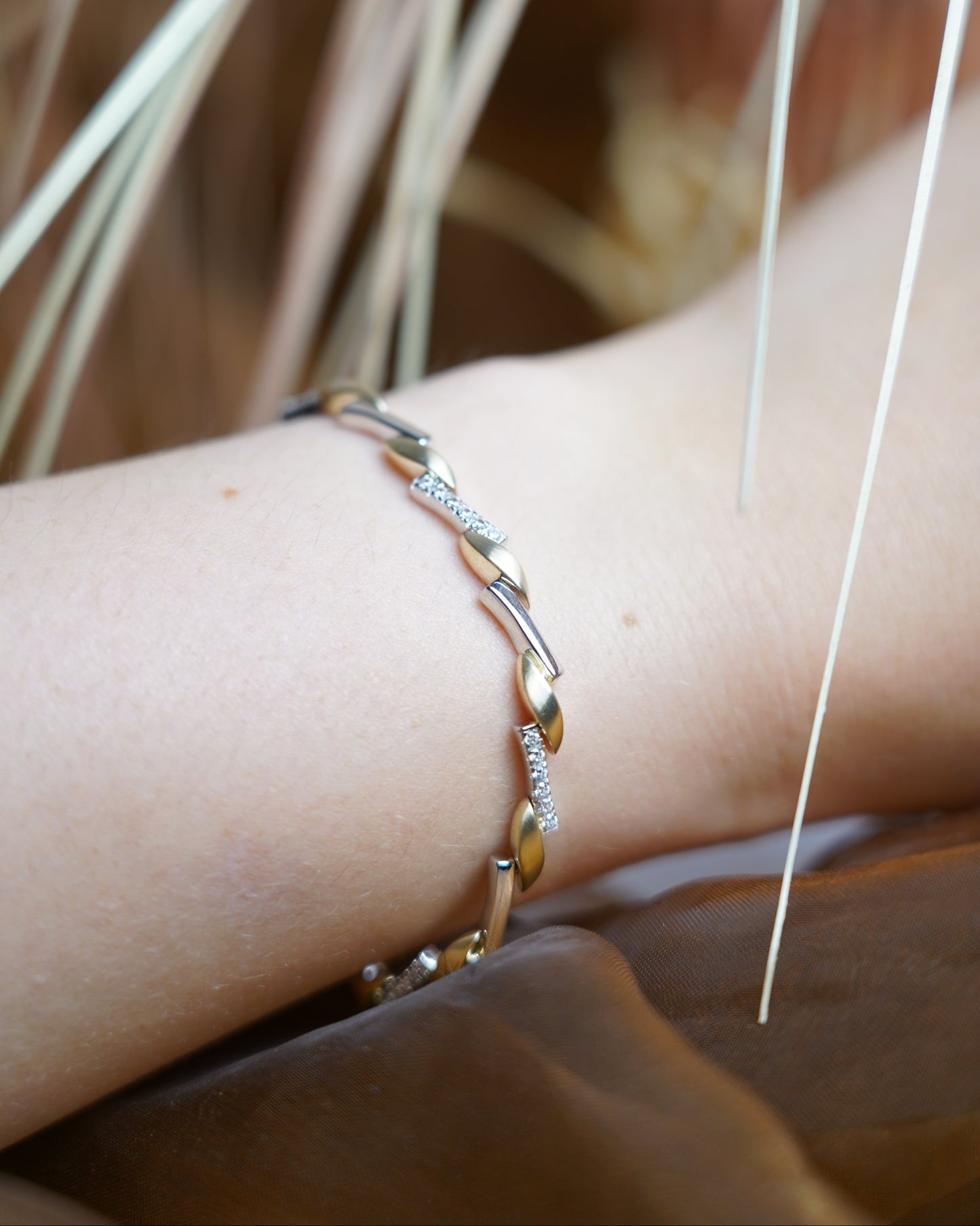„Luminous Duo“ – Armband aus 585/- Gelb- und Weißgold mit Zirkoniasteinen
