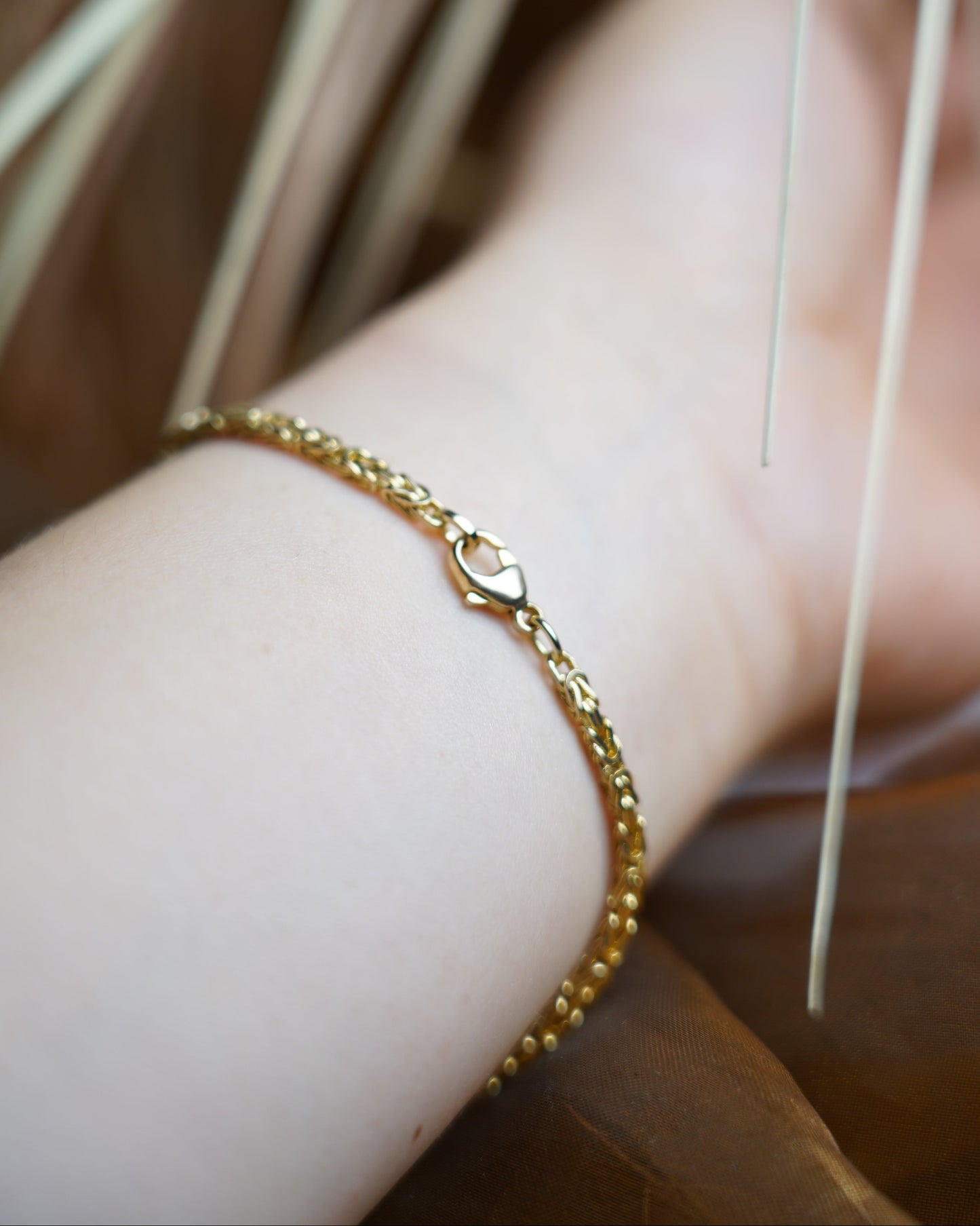 „Royal Flecht“ – Armband aus 585/- Gelbgold
