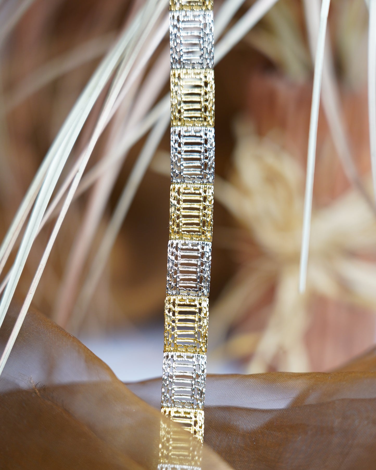 „Royal Grid“ – Armband aus 750/- Weiß- und Gelbgold