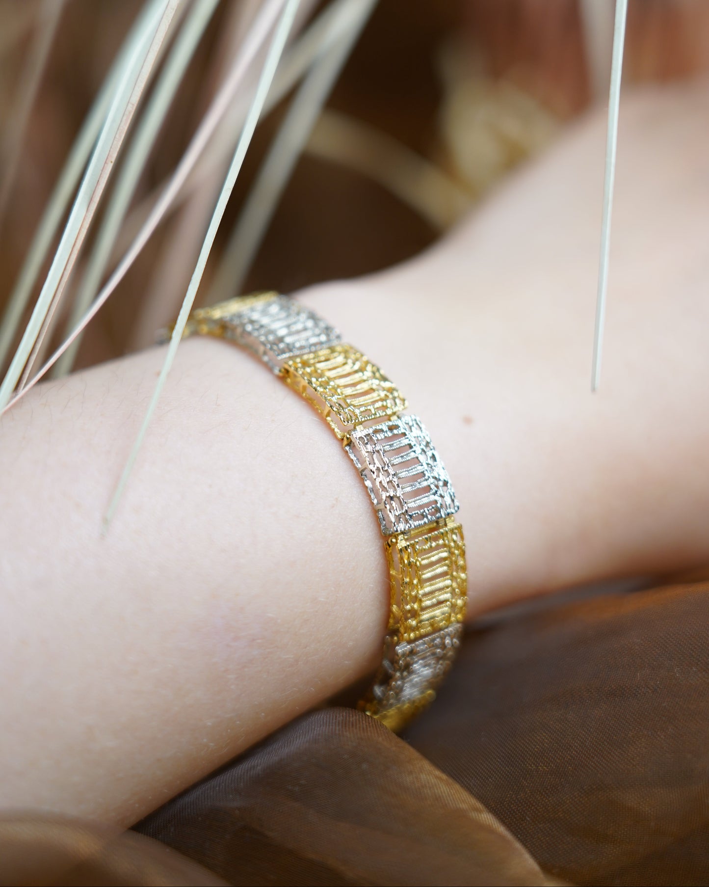 „Royal Grid“ – Armband aus 750/- Weiß- und Gelbgold